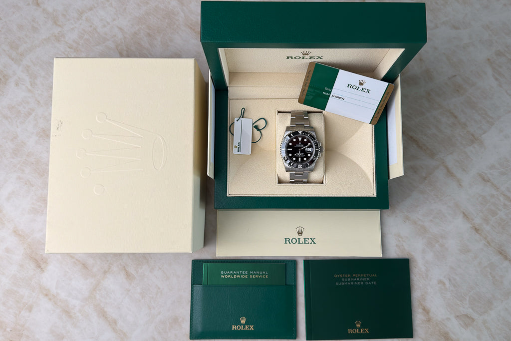 Rolex Submariner Date ref. 116610LN — zwarte wijzerplaat met Cerachrom-lunette full set in stickers