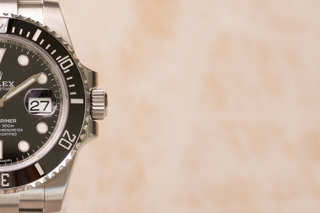 Rolex Submariner Date ref. 116610LN — zwarte wijzerplaat met Cerachrom-lunette close up half 2
